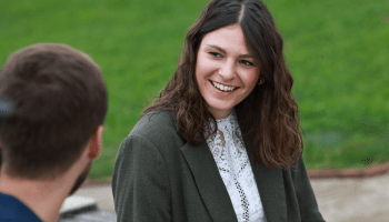 Smiling customer engaged in conversation — representing genuine connection, trust, and customer engagement strategies with Jimdo.